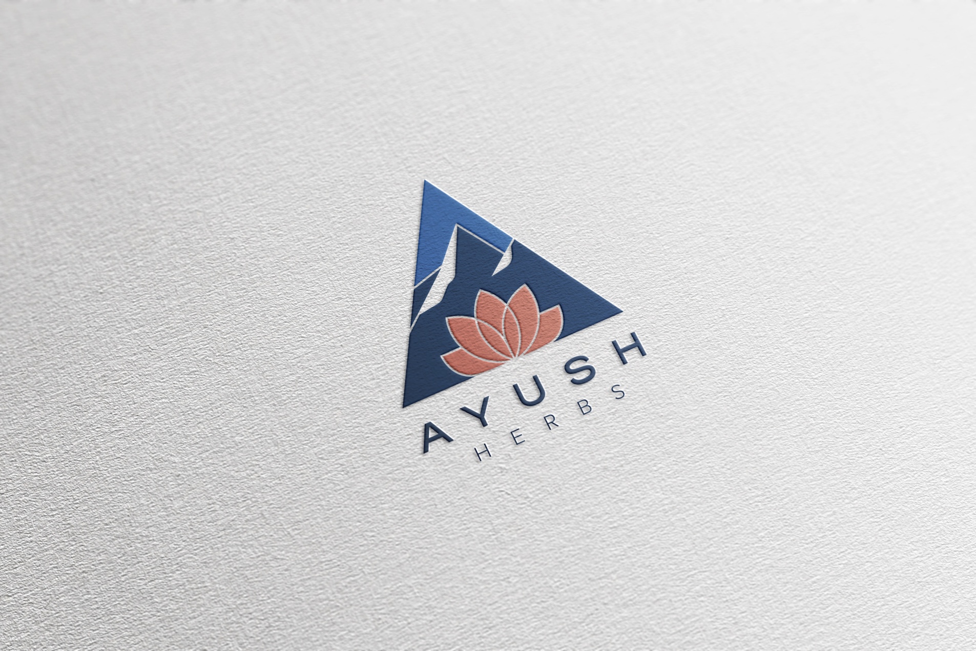 Ayush Herbs Logo design: A beautifully embossed logo on paper, representing Ayush Herbs in a visually appealing way.